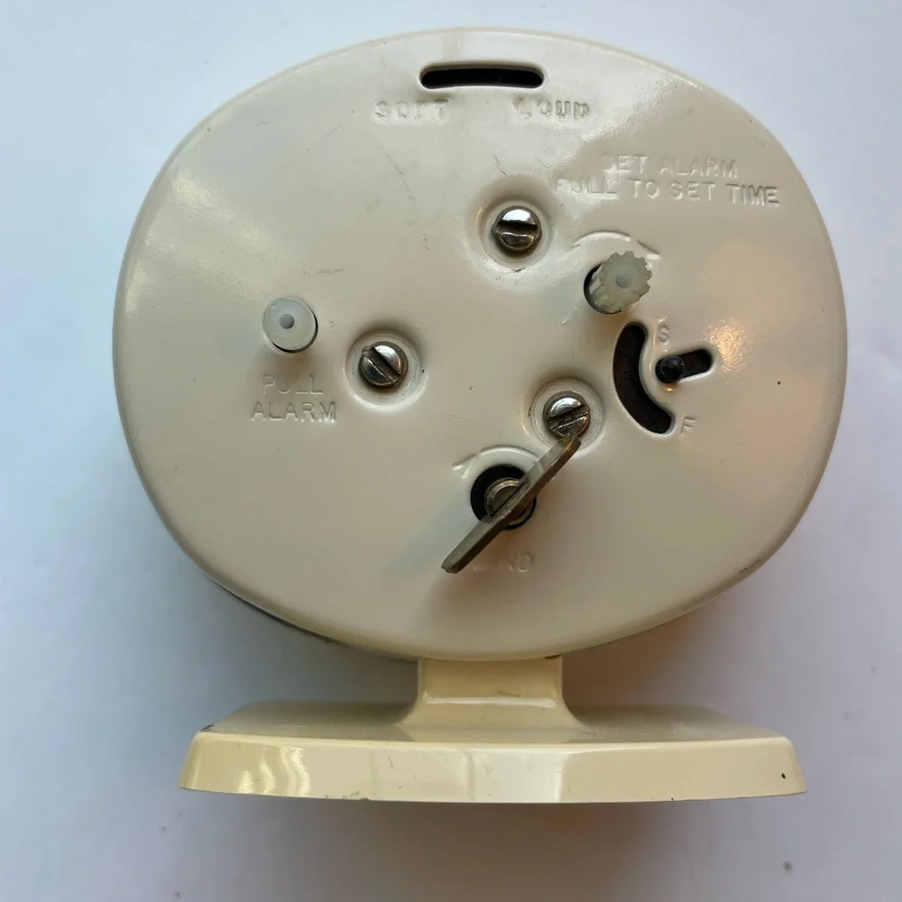Vintage Westclox tan and gold clock.